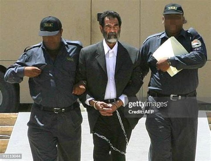 Unravel The Secrets Of Saddam Hussein's Commanding Height